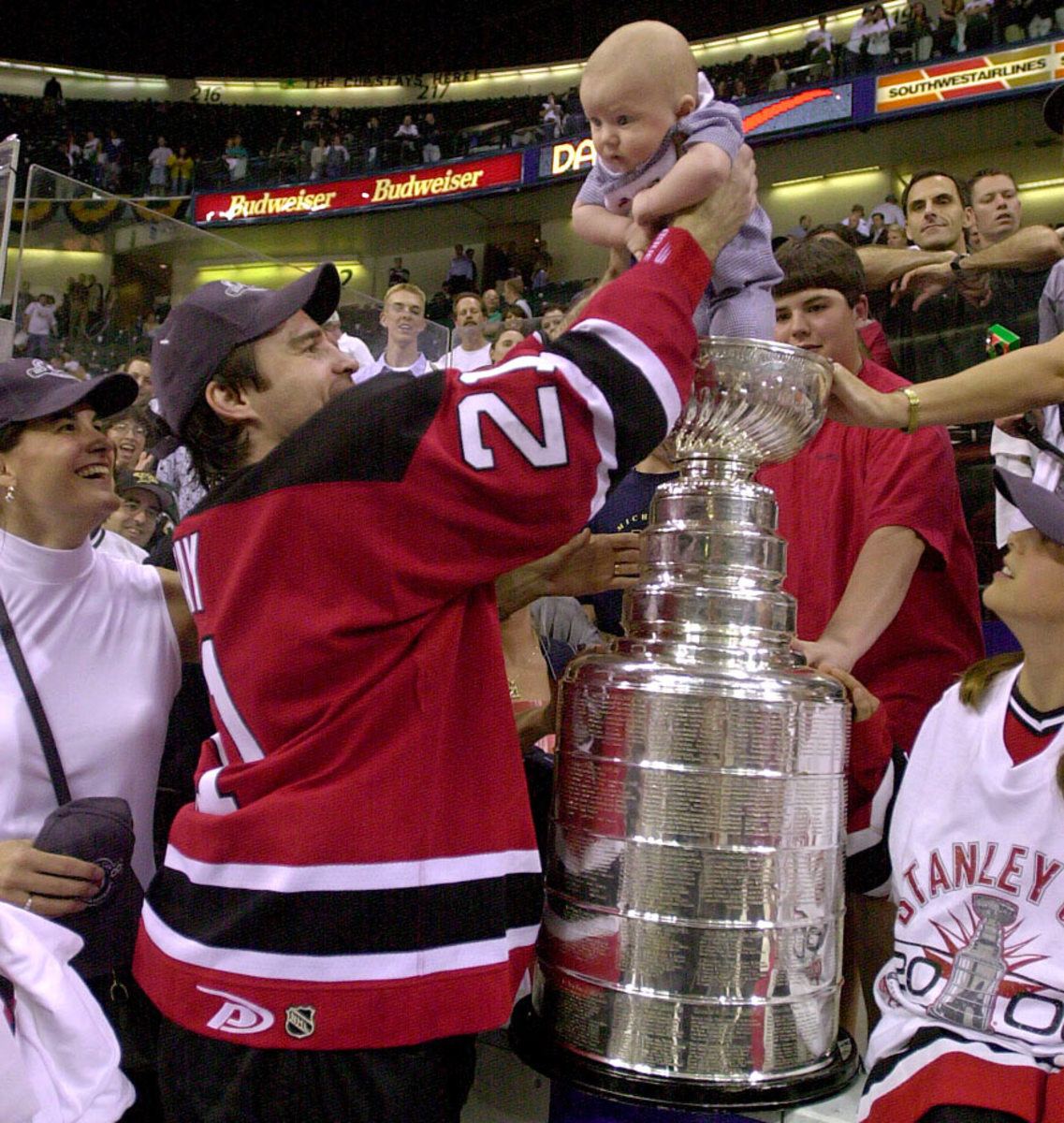 Kyle Clifford puts his baby in Stanley Cup