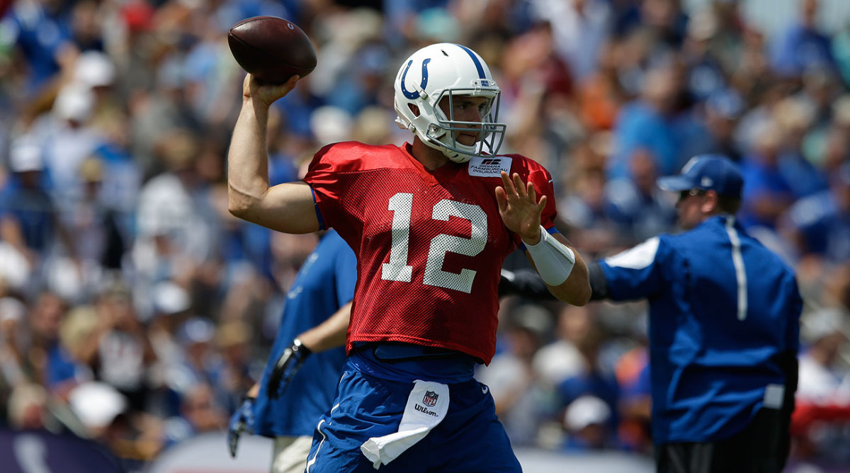 NFL Network's Steve Wyche shows Indianapolis Colts' 'Kicking the Stigma'  warm-up T-shirts before Week 2