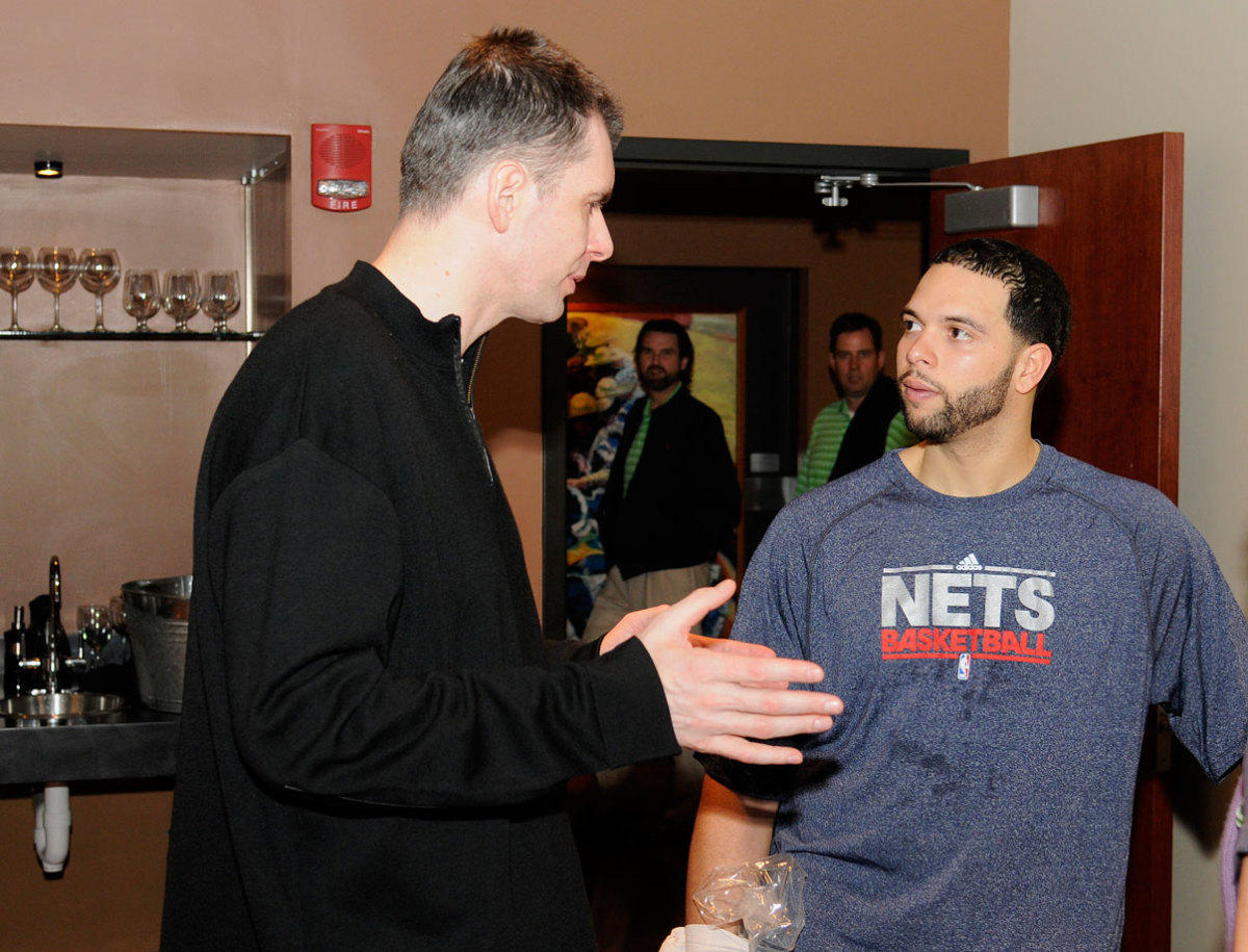 2011-0225-Mikhail-Prokhorov-Deron-Williams.jpg