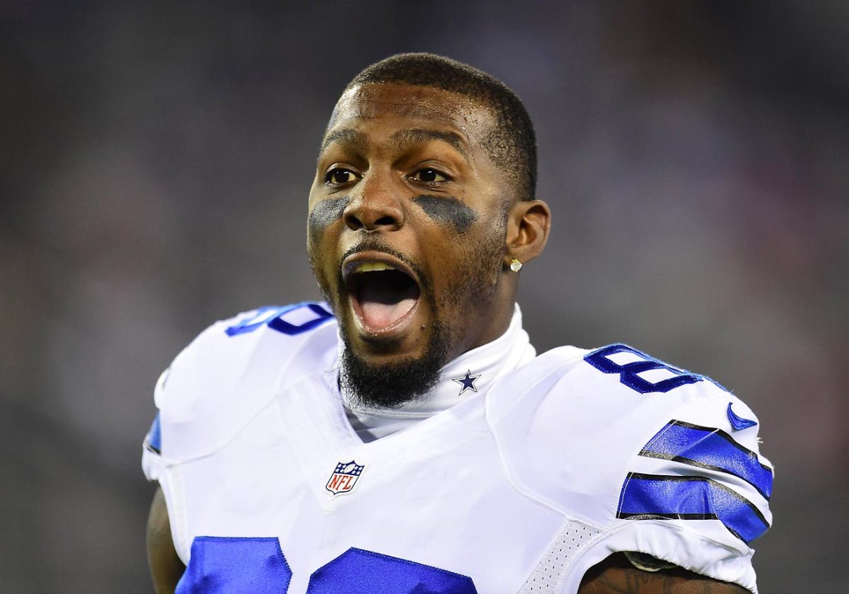Oklahoma State players freak out when Dez Bryant reveals their new uniforms