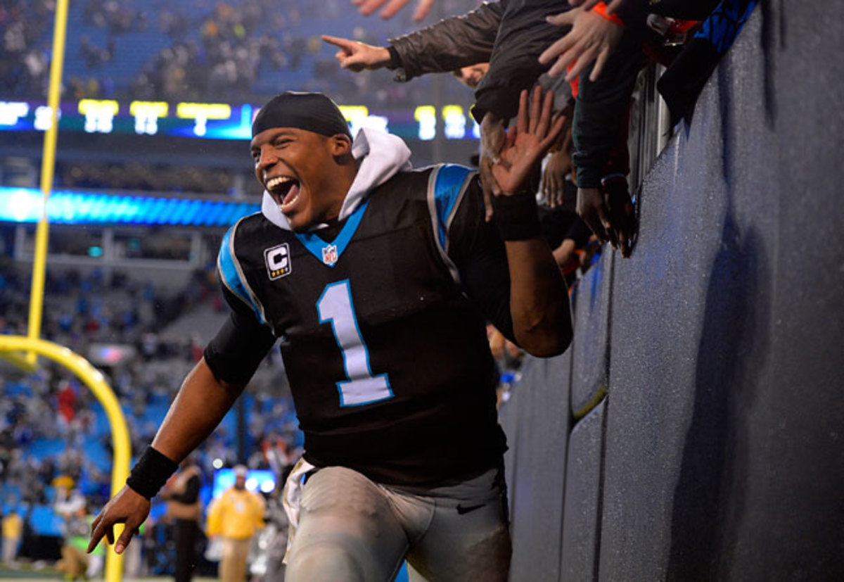 Newton celebrating the Panthers’ overtime victory against the Colts.