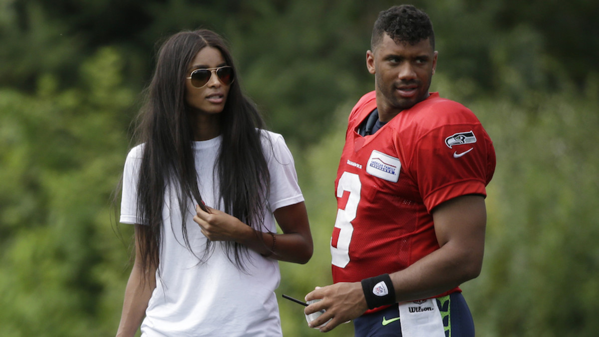 Taylor Swift, Russell Wilson share a dance - Sports Illustrated