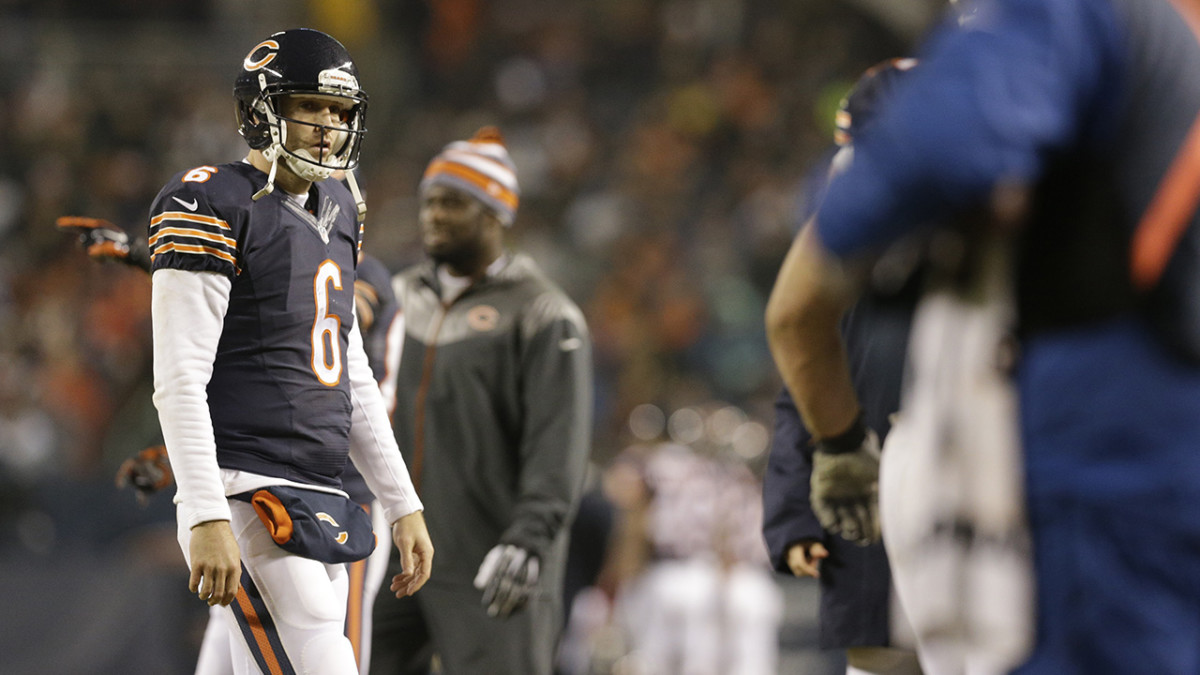 Chicago Bears new quarterback Jay Cutler holds his jersey during a