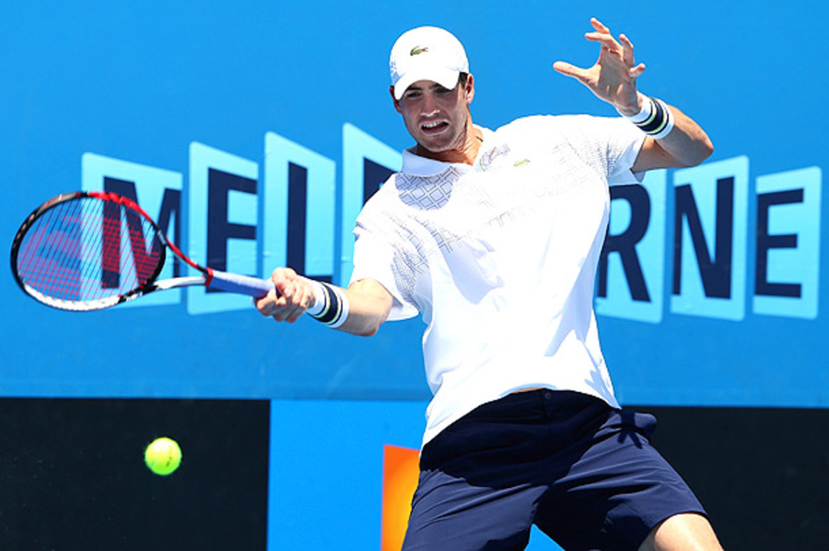 John Isner played through the pain to win the tournament in Auckland, but he couldn't bear it in Melbourne. (Robert Prezioso/Getty Images)