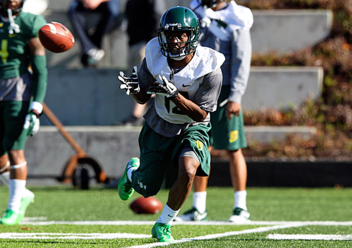 A former guard on Oregon's basketball team, Johnathan Loyd will try to help the Ducks' receiving corps.