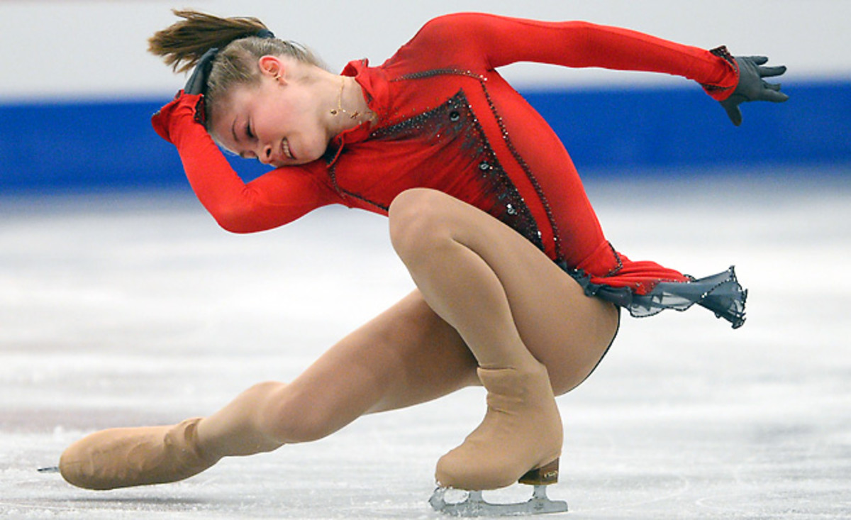 Julia Lipnitskaia, 15, made a golden debut with a dazzling free skate program to move up from second.