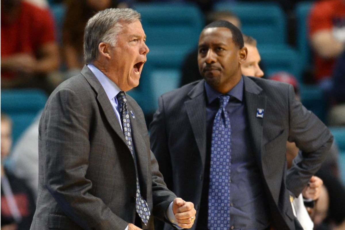 Travis DeCuire (right) worked on Mike Montgomery's staff at Cal. (Ethan Miller/Getty Images)