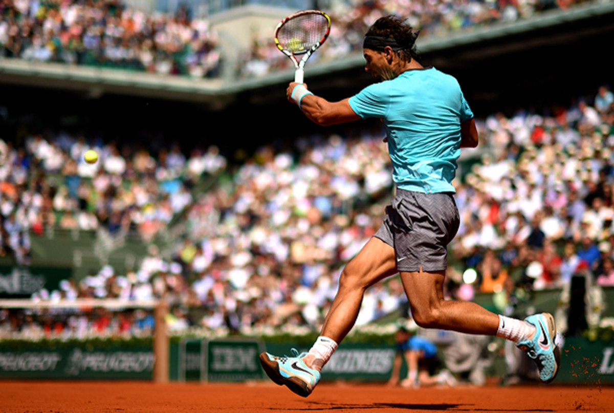 It sure doesn't look like Rafael Nadal's back is hurting from this. (Matthais Hangst/Getty Images)