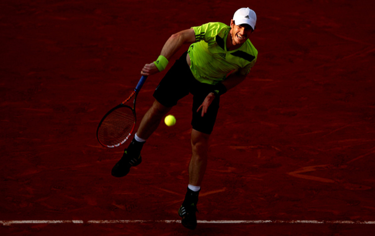 Andy Murray and Philipp Kohlschreiber were racing the setting sun during their fifth set. (Clive Brunskill/Getty Images)