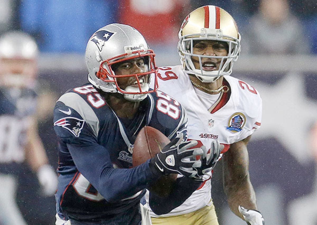 Denver Broncos wide receiver Brandon Lloyd looks on against the