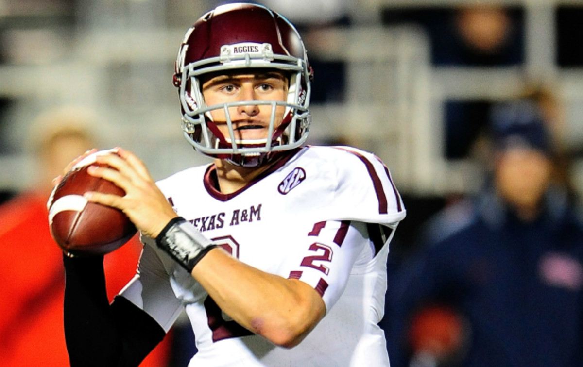 Johnny Manziel threw 63 touchdowns and 22 interceptions in his 2 years as a started for the Aggies. (Stacy Revere/Getty Images)