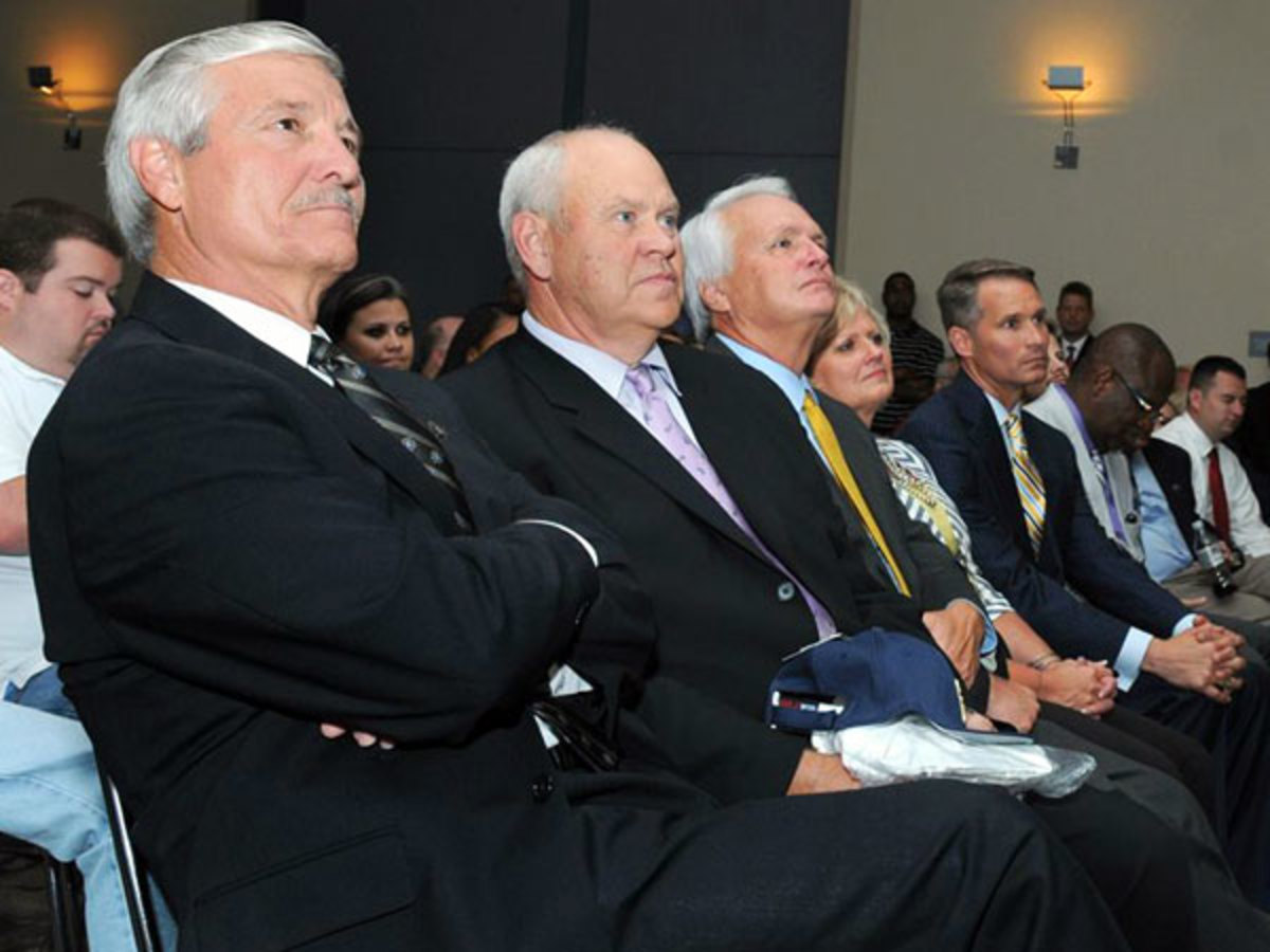 Carl Torbush (left) and Phillip Fulmer (center) are ushering in a new era of ETSU football. (Courtesy ETSU athletics)