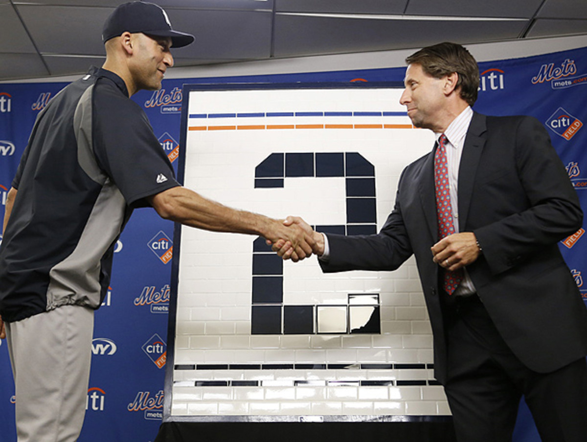 Derek Jeter (left) received a subway tile with his number on it from Jeff Wilpon and the Mets. (Kathy Willens/AP)