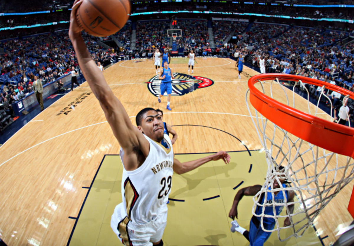 Anthony Davis isn't known as a creative dunker, but he's got a trick up his sleeve. (Layne Murdoch/NBAE via Getty Images)