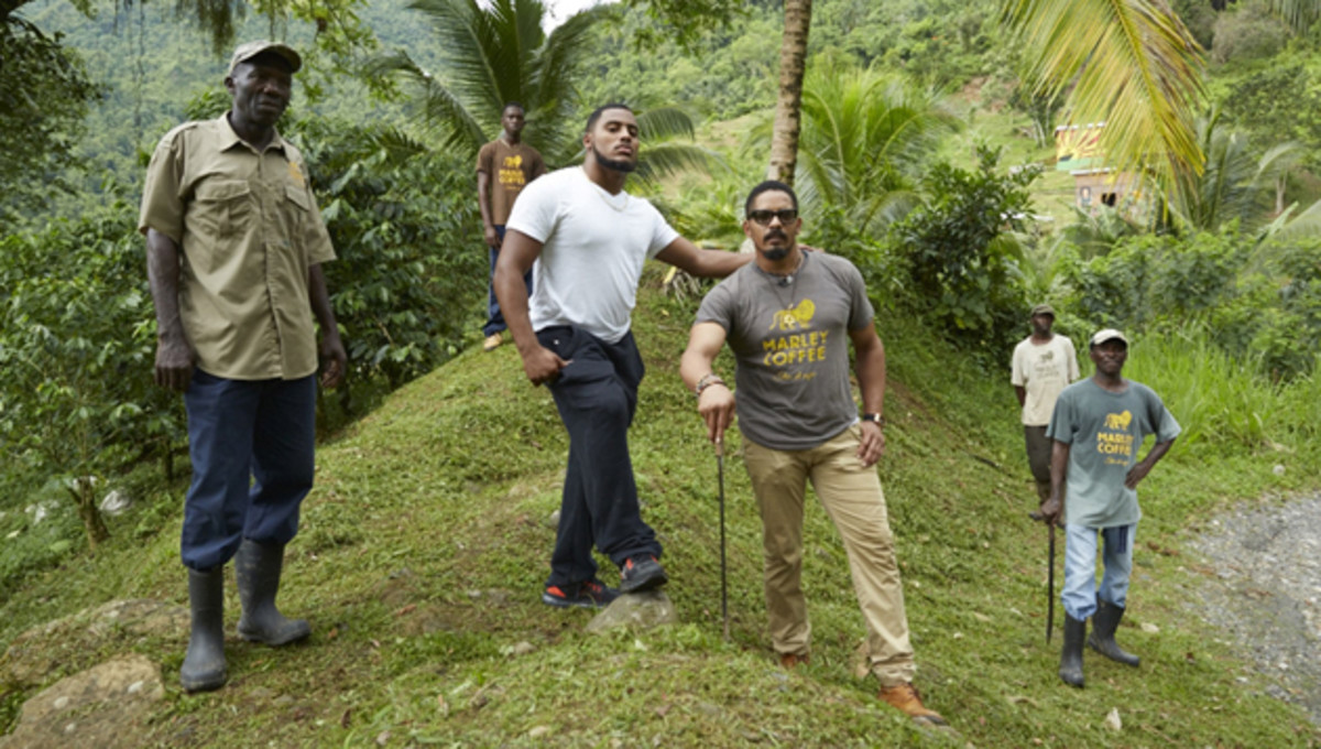 With his son, Nico (in white) in mind, Rohan (in sunglasses) built a flourishing coffee business on the his 52-acre farm. 