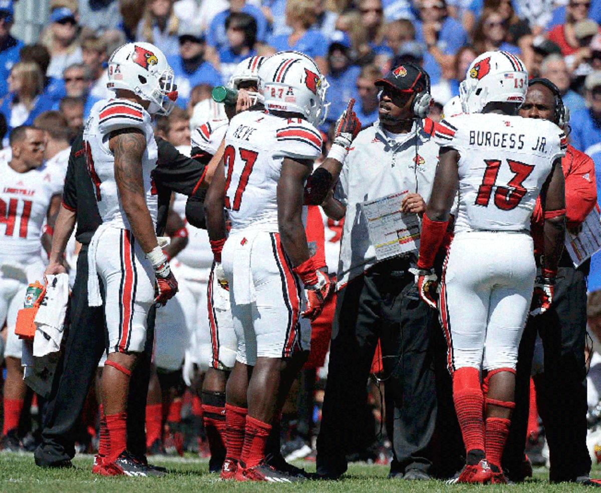 New defensive coordinator Vance Bedford will try to revive a Texas defense that struggled in 2013.