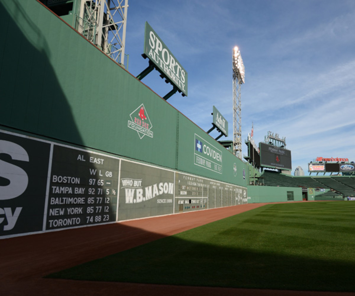 At the foot of Fenway's Green Monster there is a door. Let's go