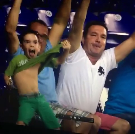 Miami Marlins fan flashes the camera on tv