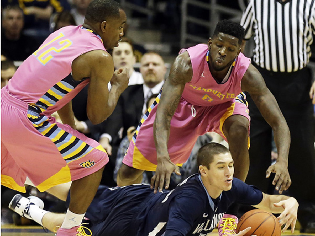 Villanova's Ryan Arcidiancono (center) made several critical plays against Marquette. (Jeffrey Phelps/AP)