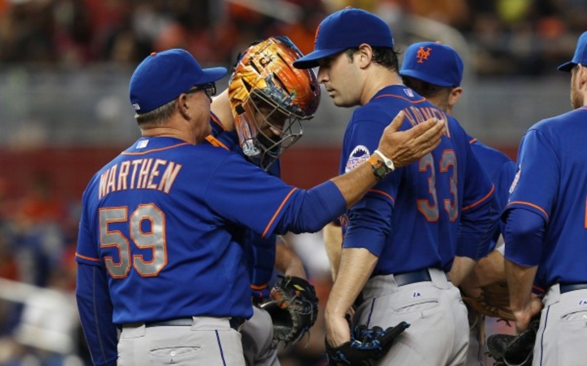 Mets pitching coach Dan Warthen is seen here with ace pitcher Matt Harvey last season. (AP Photo/J Pat Carter)