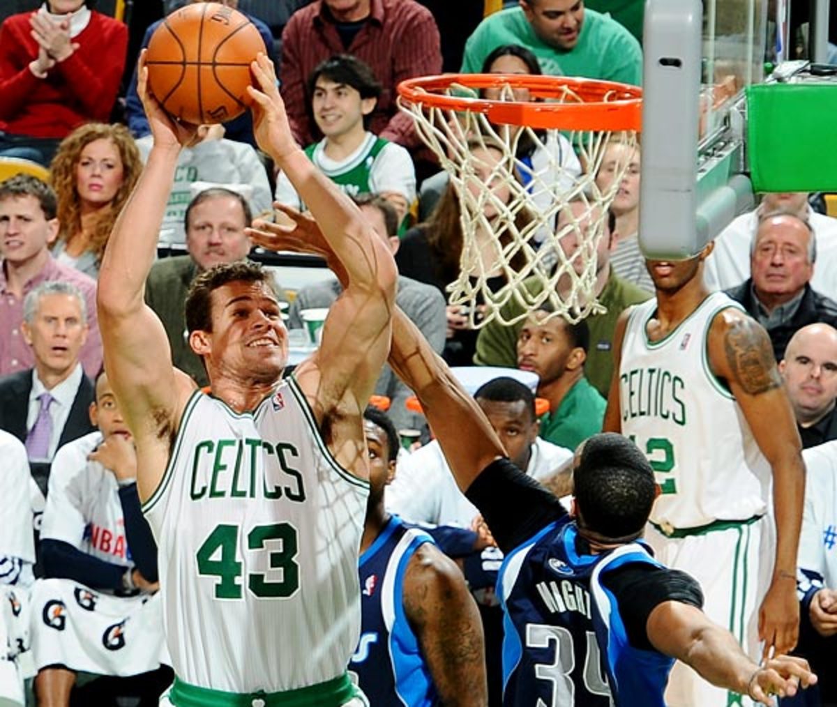 New Jersey Nets' Kris Humphries (43) shoots around Charlotte