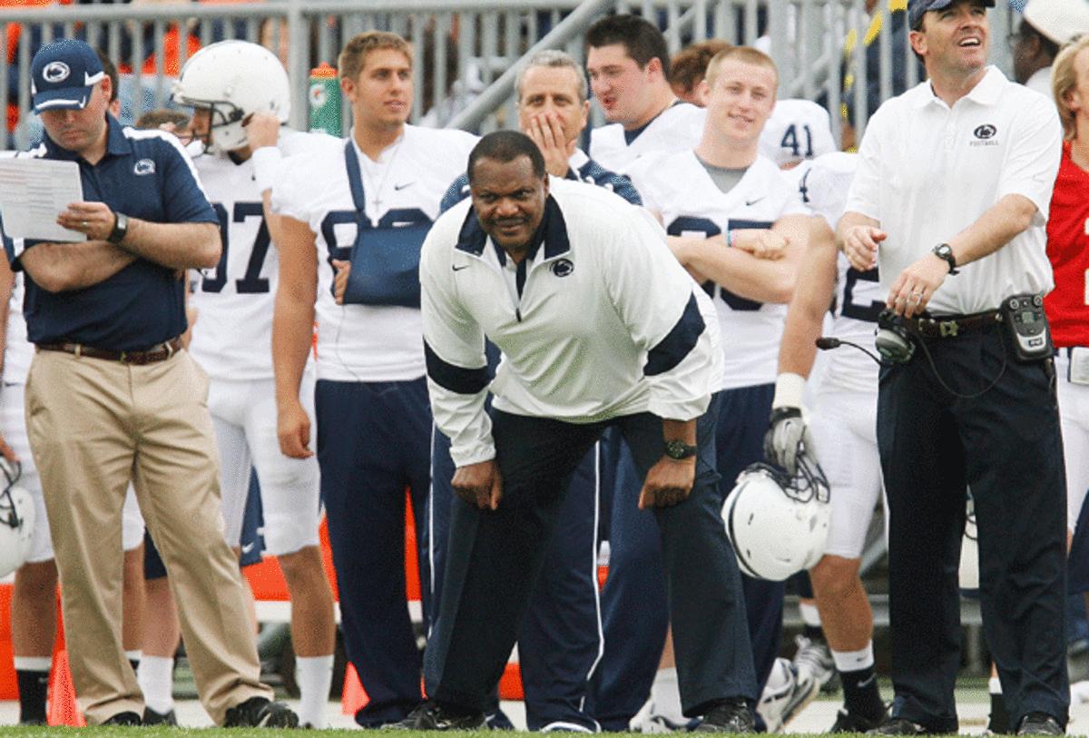 Larry Johnson (center) spent 19 years at Penn State before accepting a job with Ohio State last month.