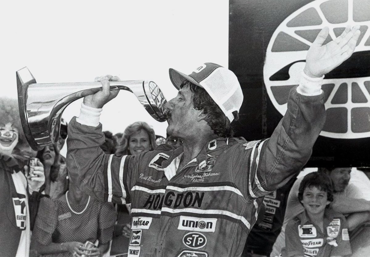 Neil-Bonnett-Victory-Lane-trophy-kiss.jpg