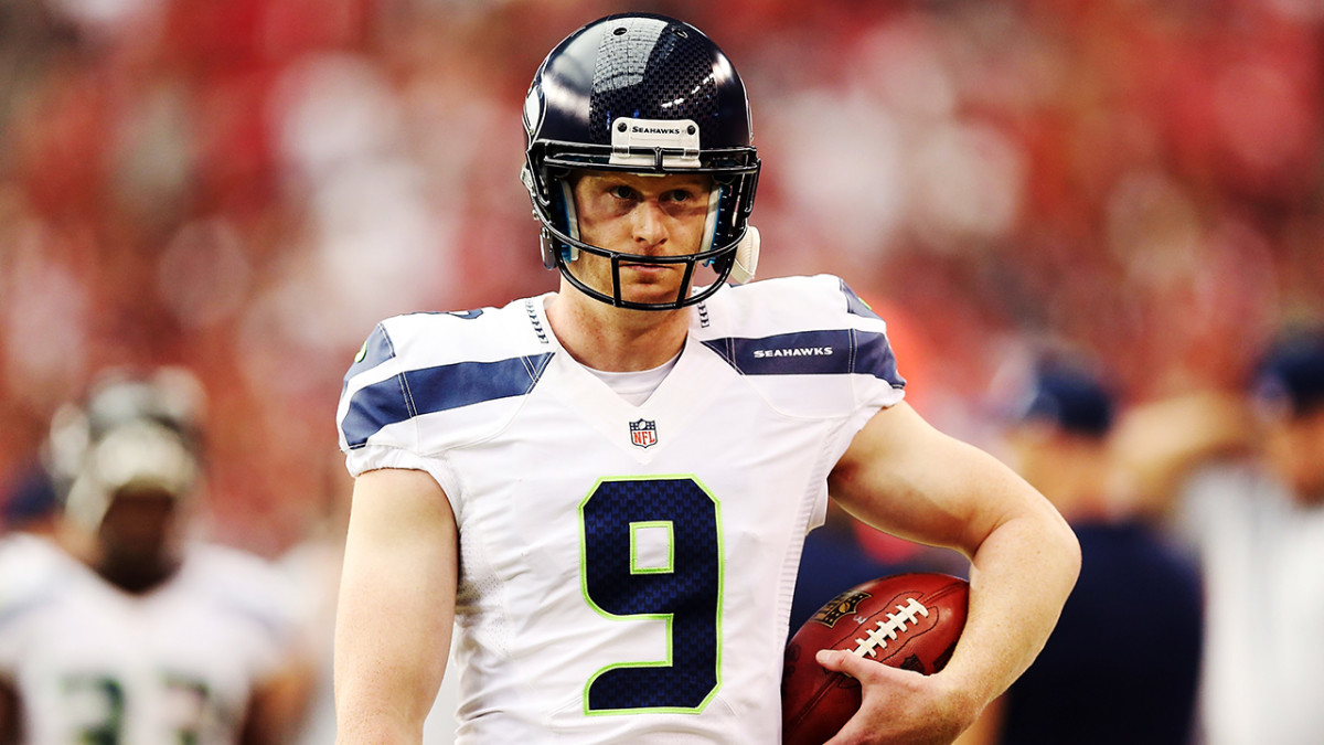 Punter Jon Ryan of the Seattle Seahawks looks on from the sideline