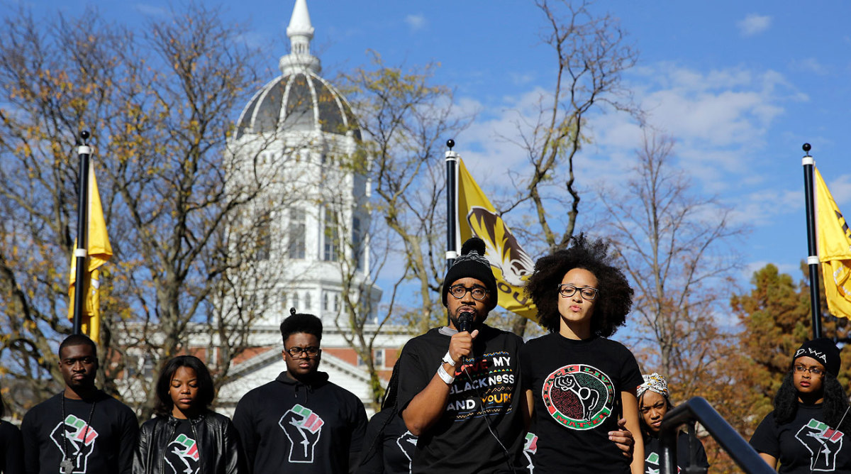 Jonathan Butler (with microphone) spoke to students Monday after ending his hunger strike.