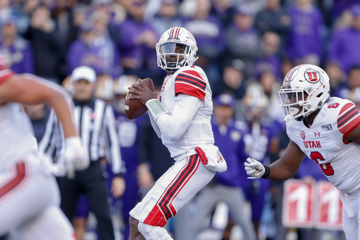 Nov 2, 2019; Seattle, WA, USA; Utah Utes quarterback Tyler Huntley (1) looks to pass against the Washington Huskies during the second quarter at Husky Stadium — Jennifer Buchanan, USA TODAY Sports