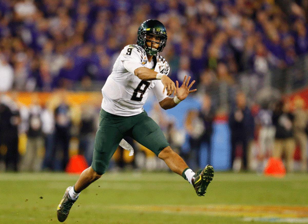 Oregon QB Marcus Mariota passed for 3,665 yards and 31 TDs with just four interceptions last season.