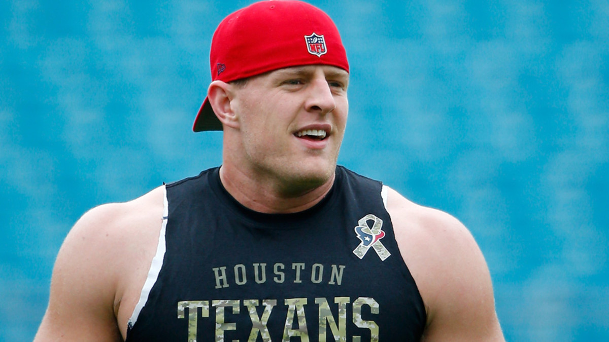 J.J. Watt gets Rock 'Em Sock 'Em Robots jersey, Turbo Man for Christmas ...