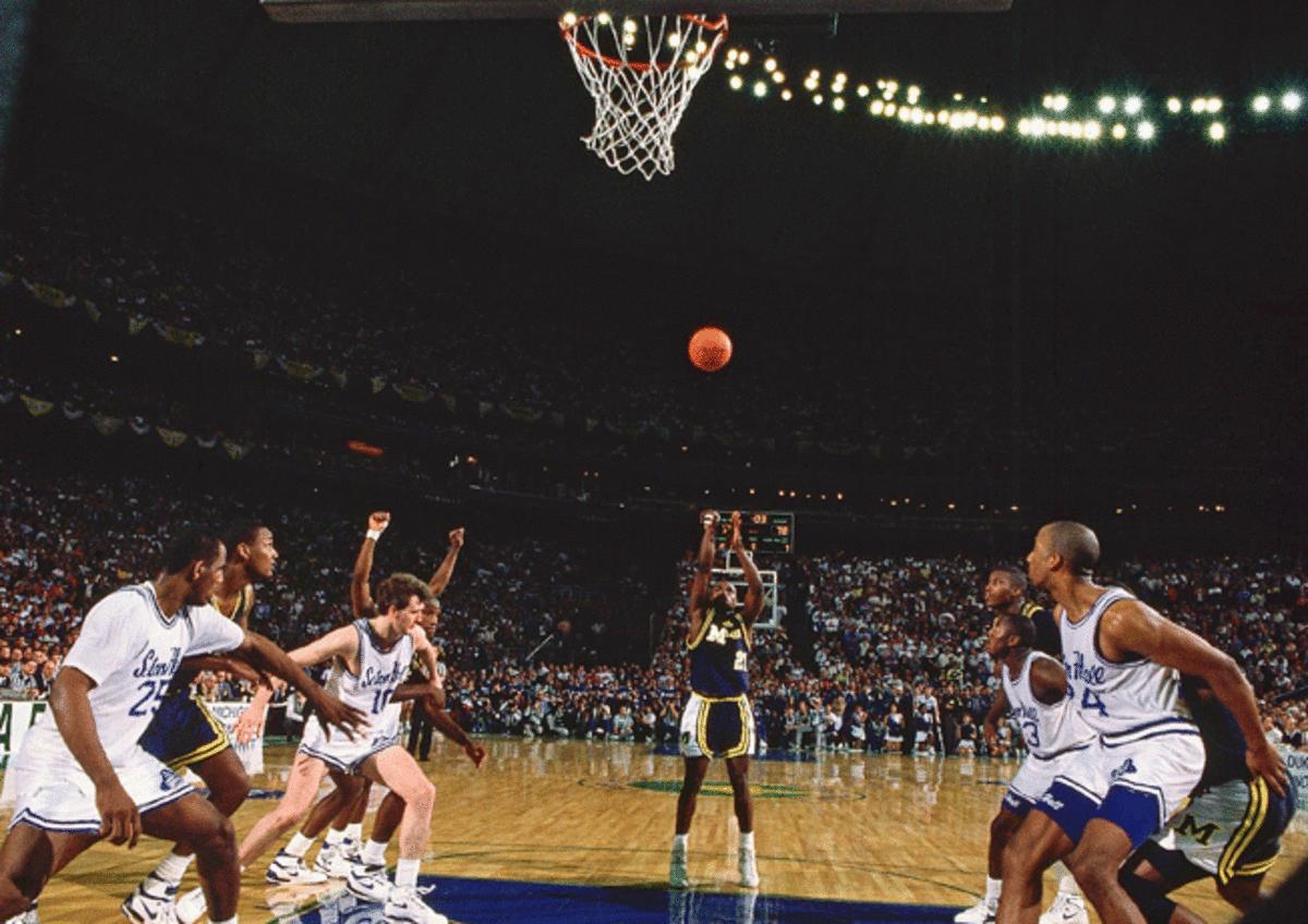 A controversial call sent Michigan's Rumeal Robinson to the line, where he hit a pair of free throws to win the game.