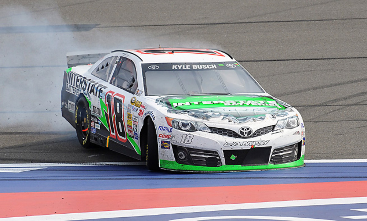 Kyle Busch survived a wild afternoon to win at Fontana in a race that featured 35 lead changes.