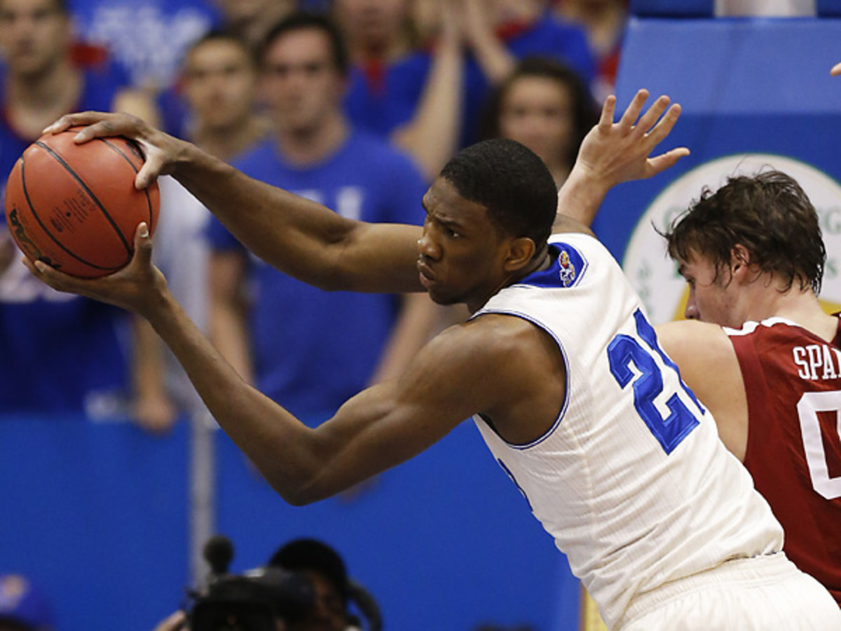 Joel Embiid's bad back will likely keep him out of the first week of the NCAA tournament. (Orlin Wagner/AP)