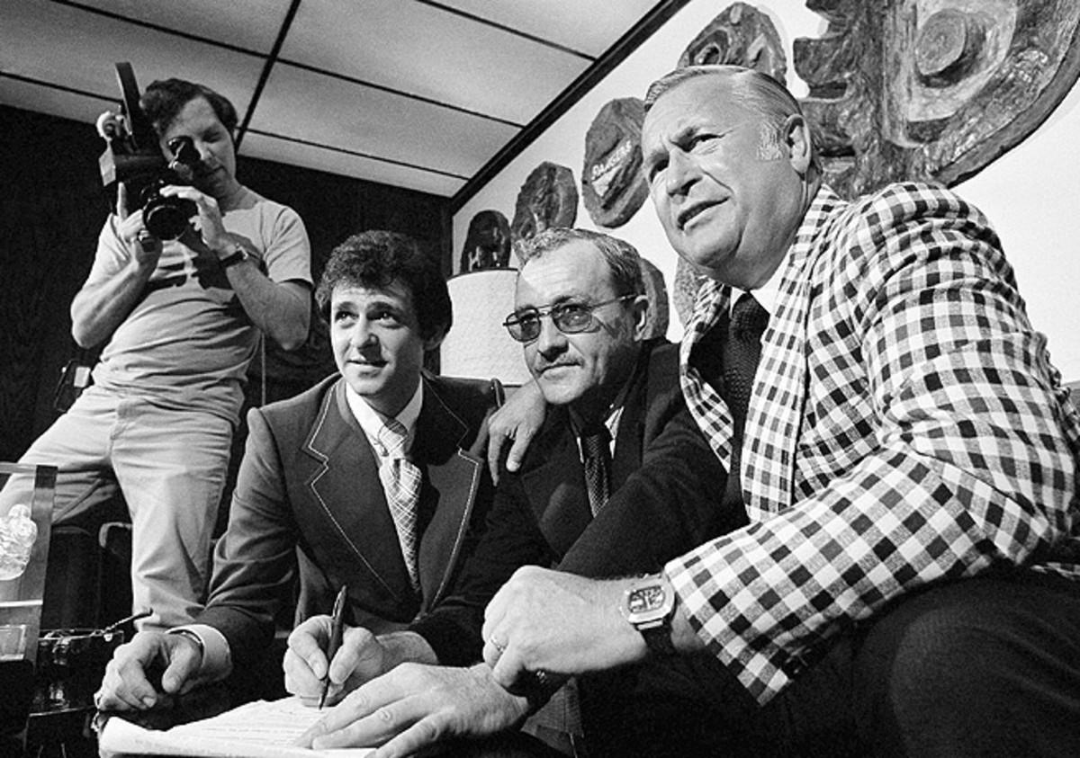 Then-Philadelphia GM Keith Allen (right) with Flyers coach Fred Shero and Mark Stewart in 1974. 