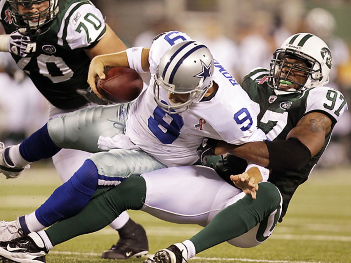 The Jets brought back Calvin Pace (97) after he finished 2013 with a career-high 10 sacks. (Julio Cortez/AP) 