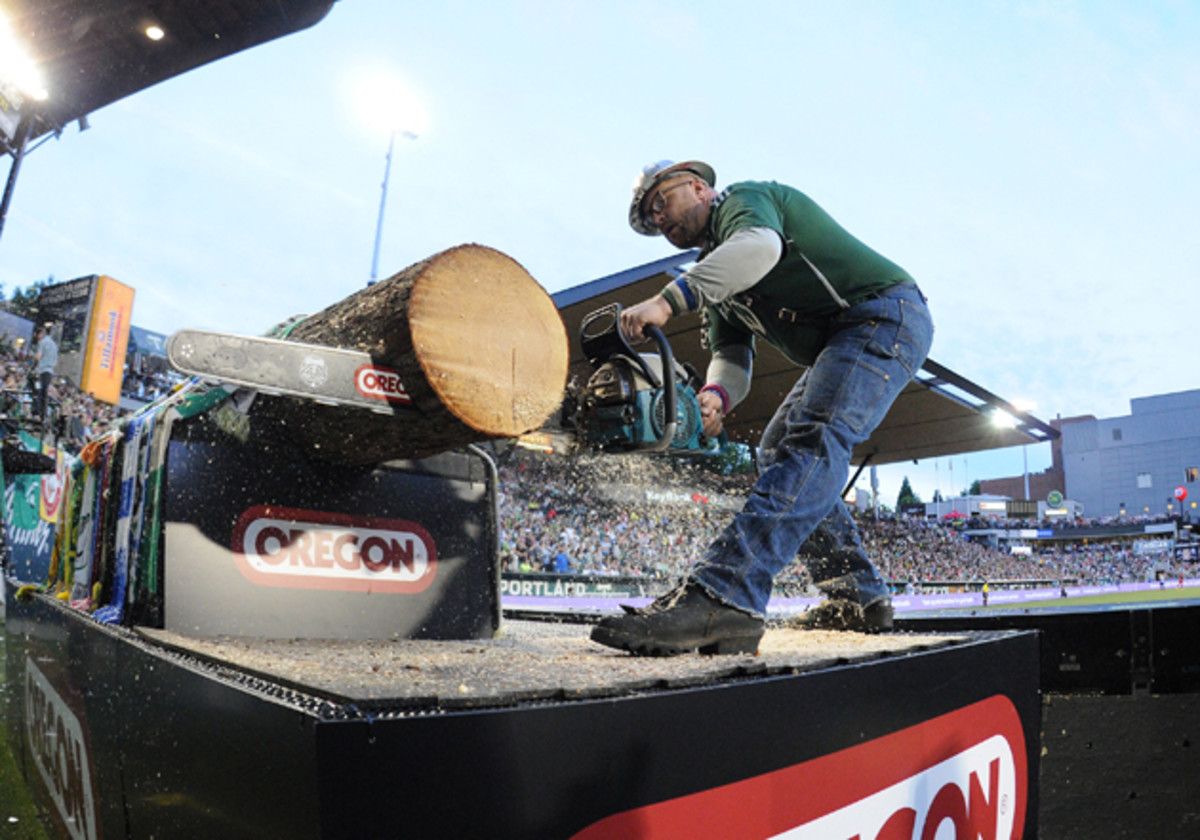 Timber Joey slices a log slab after a Portland Timbers goal at Providence Park.