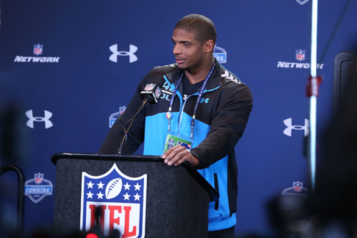 Michael Sam put his best face forward at the scouting combine. (Ben Liebenberg/AP)