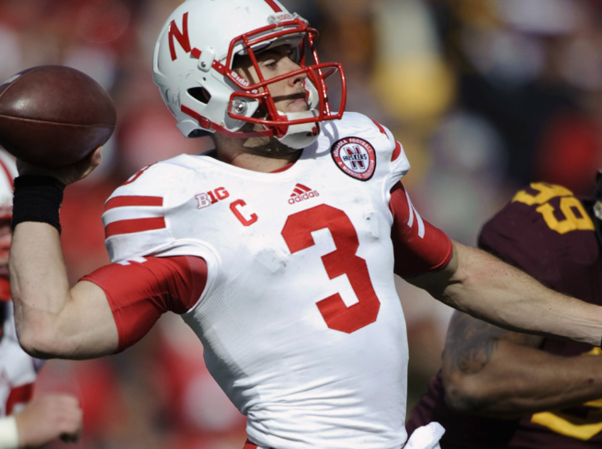 Taylor Martinez completed 16-of-30 passes for 139 yards and a score in Nebraska's loss to Minnesota.