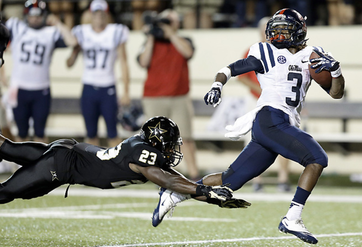 Mississippi RB Jeff Scott sheds the final tackle before scoring the game-winning 75-yard TD.