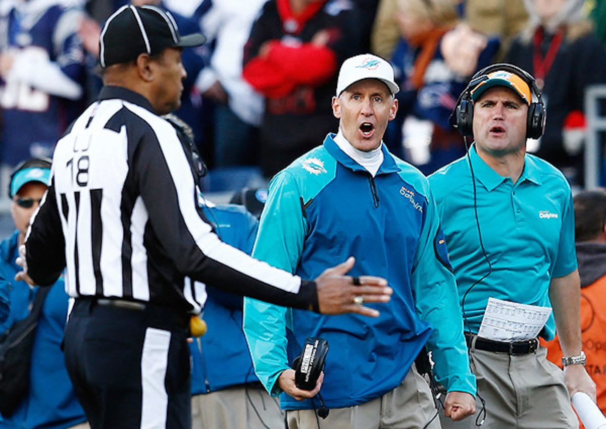 The Miami Dolphins' coaching staff reacts to the 'illegal batting' penalty which cost Miami late in the game. 