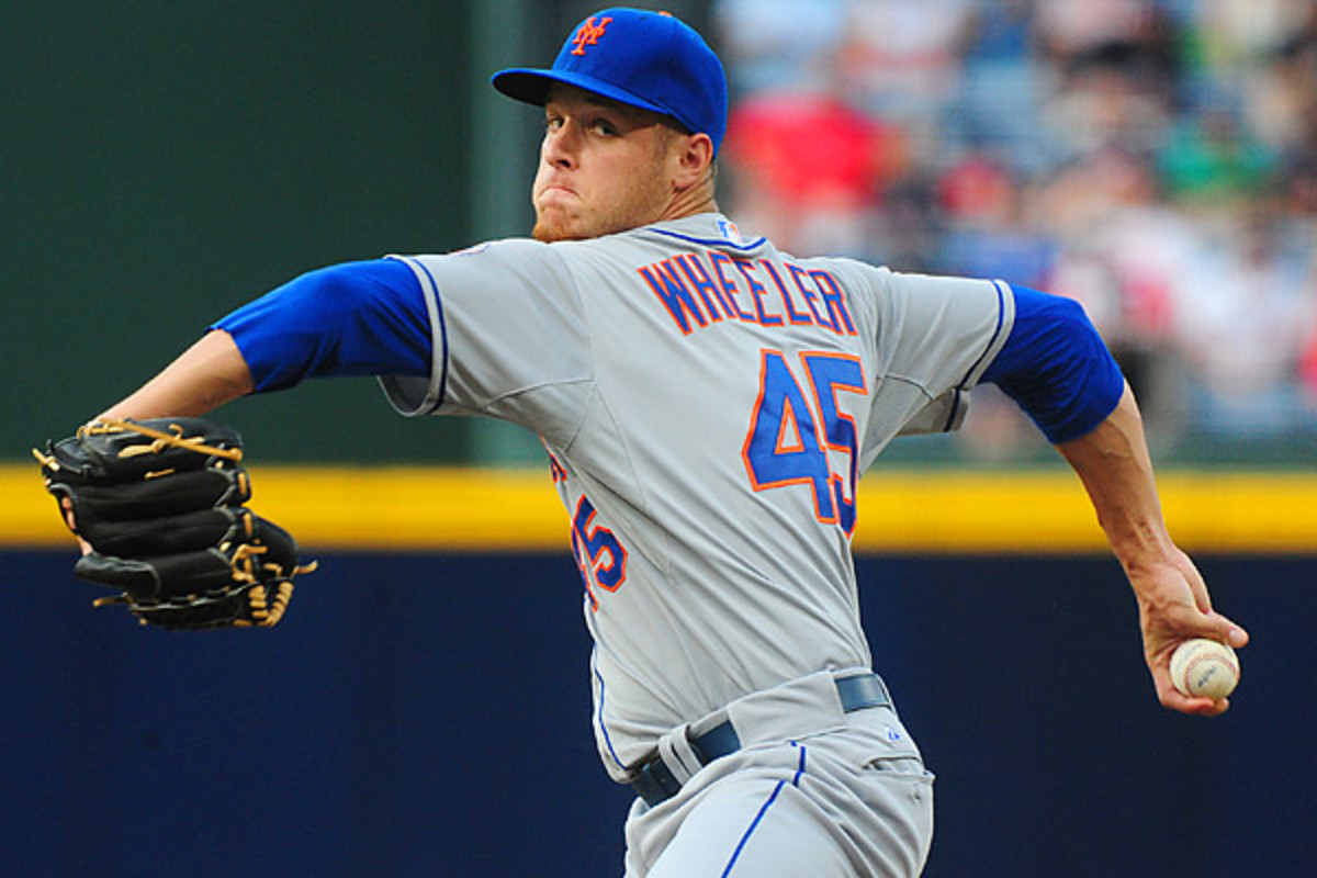 Zack Wheeler pitched six scoreless innings for the Mets, allowing just four hits in his debut. (Scott Cunningham/Getty Images)