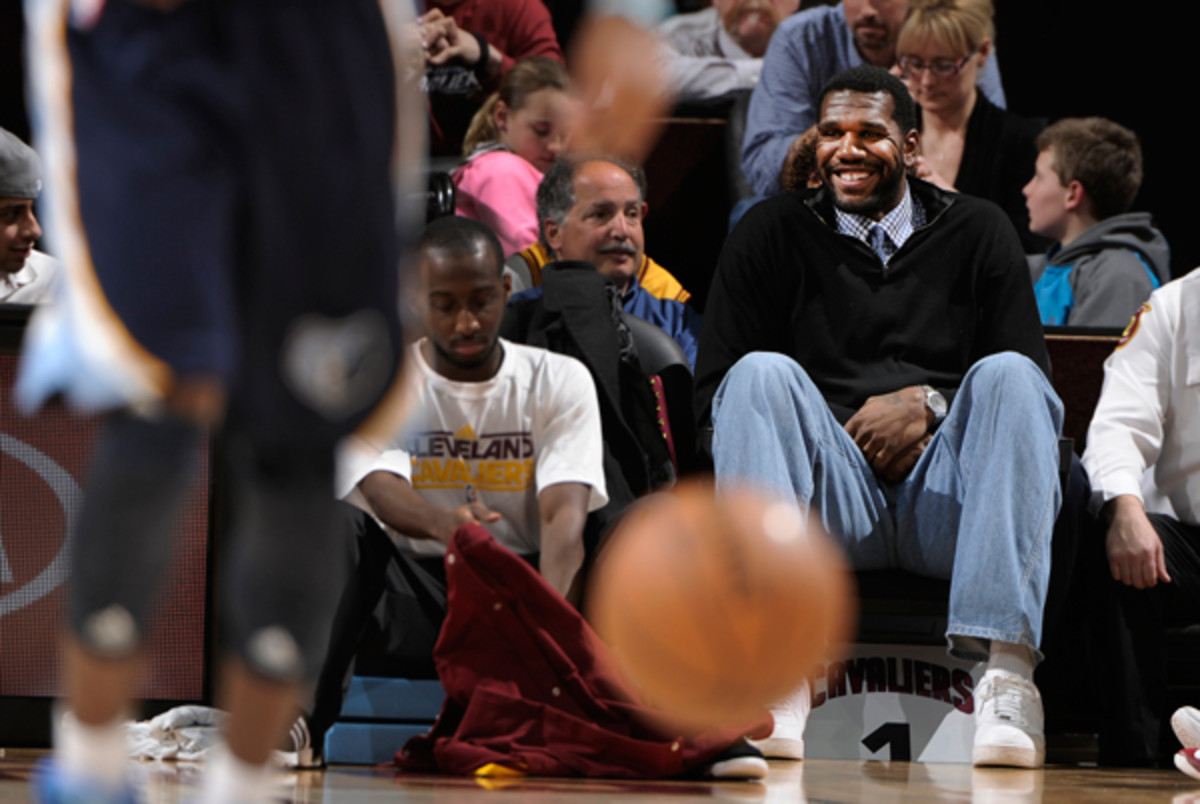 Greg Oden takes in a Cavaliers game from the stands. (David Liam Kyle/Getty Images)