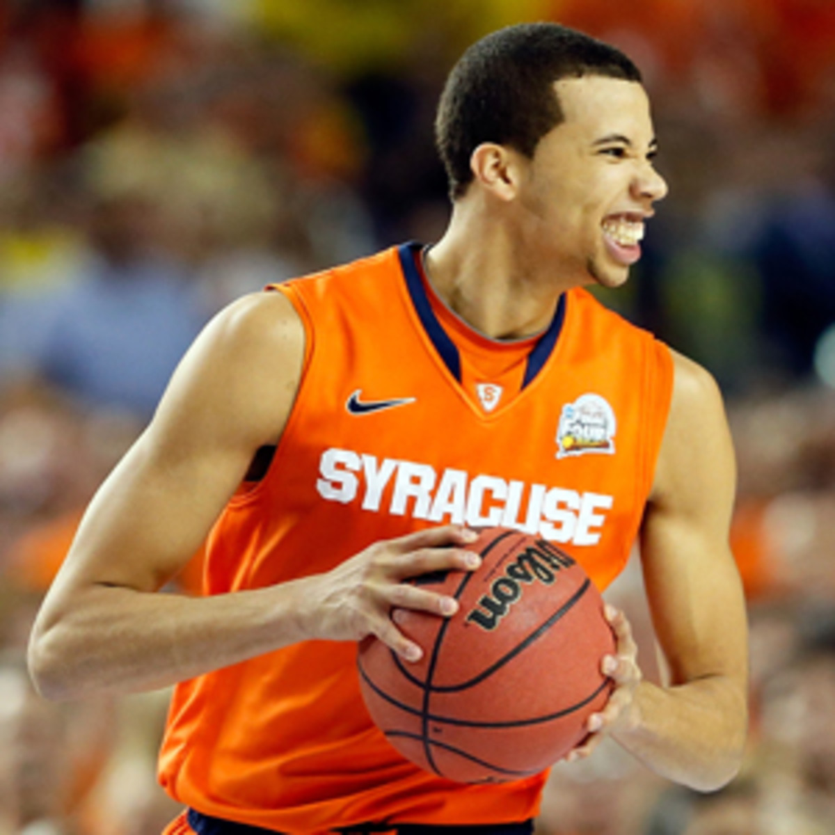 Michael Carter-Williams is projected as an NBA lottery pick after a breakout sophomore season at Syracuse. (Kevin C. Cox/Getty Images)