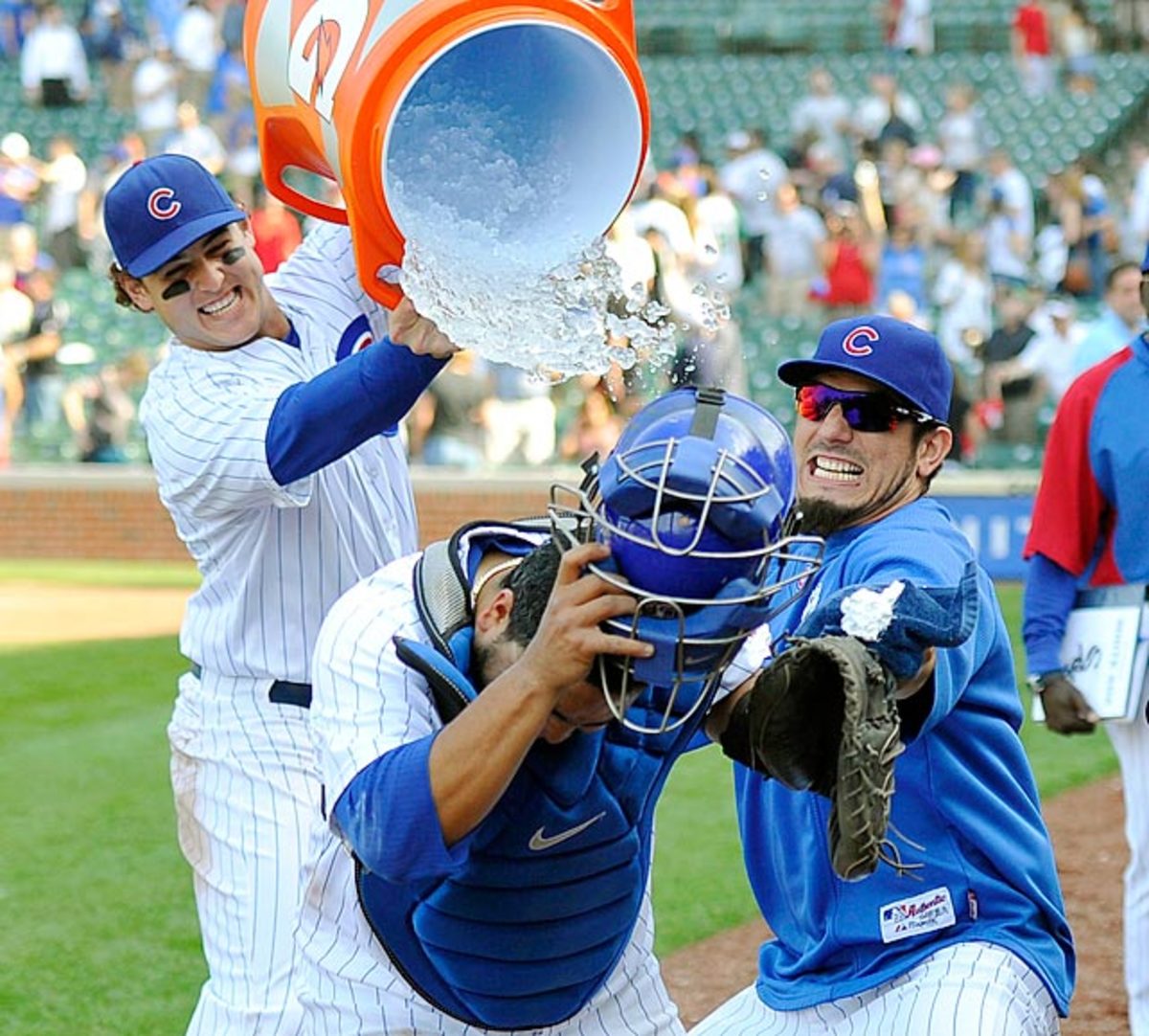 130610115827-dioner-navarro-doused-by-anthony-rizzo-matt-garza-single-image-cut.jpg