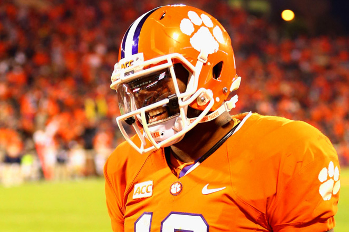 After suffering an apparent shoulder injury, Tajh Boyd left the game, but then returned to the sidelines with his helmet on. 