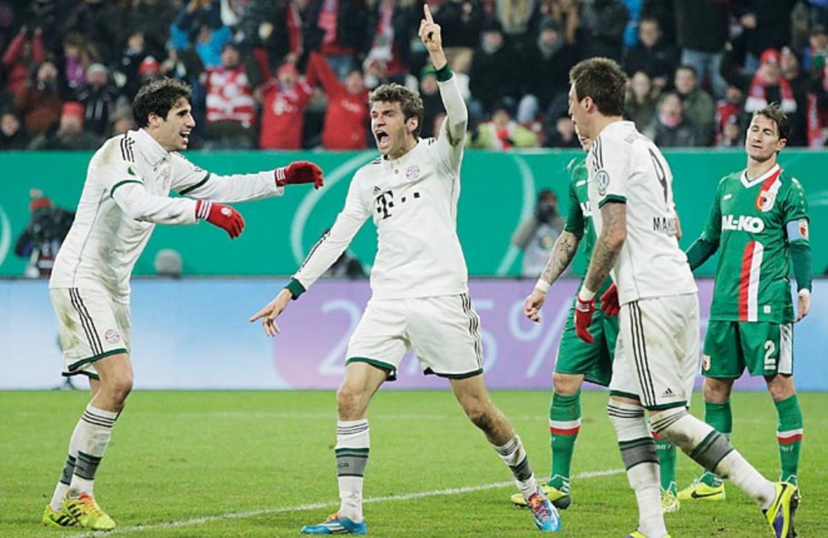 Thomas Muller scored Bayern Munich's second goal as they moved on in the German Cup on Wednesday.