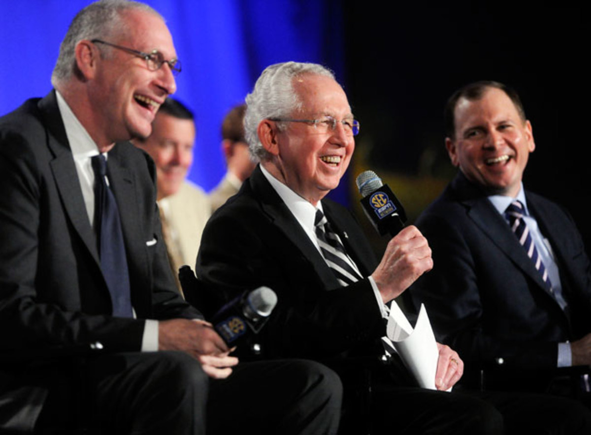 ESPN's John Skipper (left) and SEC commissioner Mike Slive (center) unveiled network plans in May.