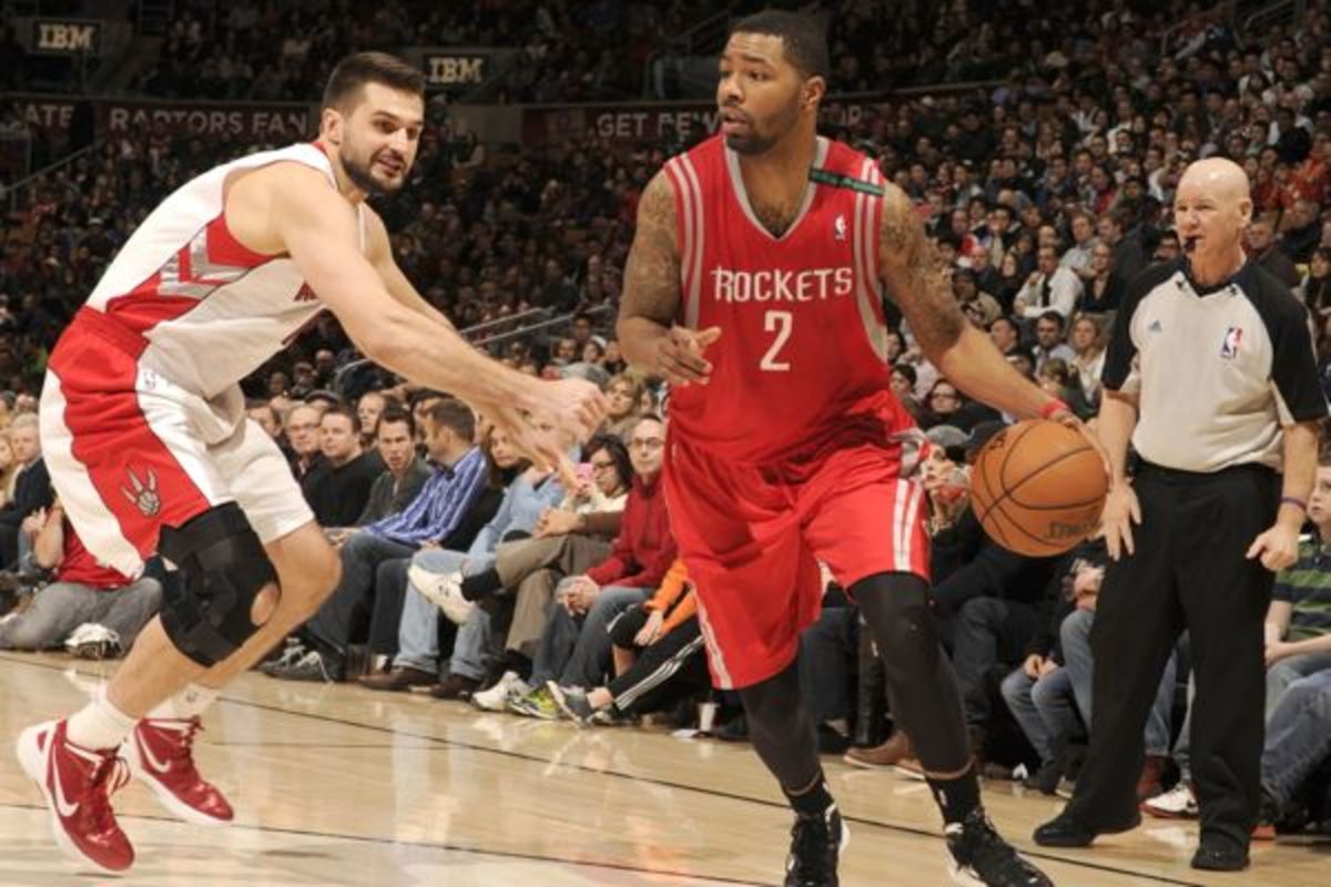 Linas Kleiza (left) has been released by the Raptors after three seasons. (Ron Turenne/Getty Images)